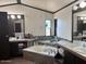 This primary bathroom has dual sinks, accent tile and a relaxing soaking tub at 9302 E Broadway Rd # 129, Mesa, AZ 85208