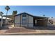 Manufactured home featuring covered parking at 9302 E Broadway Rd # 129, Mesa, AZ 85208