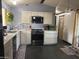 Well-lit kitchen featuring stainless steel appliances at 9302 E Broadway Rd # 129, Mesa, AZ 85208