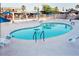 Resort-style pool with plenty of seating, clear blue water and well maintained pool deck at 9302 E Broadway Rd # 129, Mesa, AZ 85208