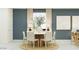Modern dining room with stylish furniture, neutral decor, and large window with natural light at 9534 W Catalina Dr, Phoenix, AZ 85037