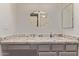 Bathroom with vanity, drawers, decorative mirrors and granite vanity top at 1021 S Greenfield Rd # 1211, Mesa, AZ 85206