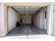 Spacious two-car garage with ample storage cabinets and automatic door at 1021 S Greenfield Rd # 1211, Mesa, AZ 85206