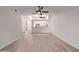 Open-concept living room with modern finishes, neutral paint, and seamlessly connected to the kitchen at 1021 S Greenfield Rd # 1211, Mesa, AZ 85206