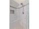 Modern shower with stylish tile surround, built in bench, and shower niche at 1021 S Greenfield Rd # 1211, Mesa, AZ 85206