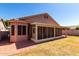 Exterior view of a backyard with a covered patio at 11338 E Contessa St, Mesa, AZ 85207