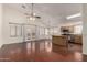 Open-concept living area featuring hardwood floors and ample natural light at 11338 E Contessa St, Mesa, AZ 85207