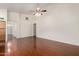 Open floorplan featuring hardwood floors, neutral walls, and ample space at 11338 E Contessa St, Mesa, AZ 85207