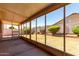 Screened in patio with a view of the backyard at 11338 E Contessa St, Mesa, AZ 85207