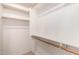 Spacious walk-in closet with built-in shelving, offering ample storage space at 11338 E Contessa St, Mesa, AZ 85207