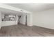 Bright living room featuring an open floor plan with a modern kitchen and stylish furniture at 122 S Hardy Dr # 62, Tempe, AZ 85281