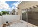 Upper-level patio featuring a sliding glass door with community views at 122 S Hardy Dr # 62, Tempe, AZ 85281