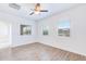 Bedroom with wood look floors, ceiling fan, and windows with blinds at 1367 S Country Club S Dr # 1125, Mesa, AZ 85210