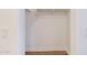 A small walk-in closet with a light switch, white walls, and wood floor at 1367 S Country Club S Dr # 1125, Mesa, AZ 85210
