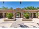 Entrance to community pool and lounge area with palm trees and manicured landscaping at 1367 S Country Club S Dr # 1125, Mesa, AZ 85210