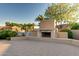 Outdoor fireplace with stone surround is a perfect place to enjoy the neighborhood pool and Arizona evenings at 1367 S Country Club S Dr # 1125, Mesa, AZ 85210