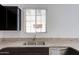 Kitchen features granite countertops, stainless steel appliances, and dark wood cabinetry at 1367 S Country Club S Dr # 1125, Mesa, AZ 85210