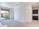 Bright landing area with slider to balcony and dark cabinet at 1367 S Country Club S Dr # 1125, Mesa, AZ 85210