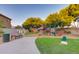 Community playground with slides and climbing structures adjacent to walking paths at 1367 S Country Club S Dr # 1125, Mesa, AZ 85210