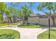 A grassy courtyard area features walkways and mature trees at 15095 N Thompson Peak Pkwy # 3032, Scottsdale, AZ 85260