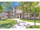 Well-manicured lawn leads to this property's condo buildings at 15095 N Thompson Peak Pkwy # 3032, Scottsdale, AZ 85260