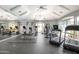 An indoor fitness center features cardio equipment, weight machines, and free weights at 15095 N Thompson Peak Pkwy # 3032, Scottsdale, AZ 85260