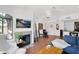 Open living area with a fireplace, modern furnishings, and plenty of natural light for a comfortable atmosphere at 15095 N Thompson Peak Pkwy # 3032, Scottsdale, AZ 85260
