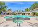 A community pool and hot tub offer a place to relax and enjoy the weather at 15095 N Thompson Peak Pkwy # 3032, Scottsdale, AZ 85260