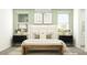 Cozy bedroom featuring a comfortable bed, stylish nightstands, and ambient lighting at 15600 W Williams St, Goodyear, AZ 85338