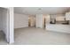 Spacious living area showcasing open concept design, neutral colors, and tile flooring at 15600 W Williams St, Goodyear, AZ 85338