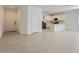 Open-concept living area with stainless steel appliances and plenty of natural light at 15600 W Williams St, Goodyear, AZ 85338