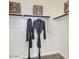Neat closet features simple shelving and hanging space at 15627 W Williams St, Goodyear, AZ 85338