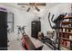 Bonus room with workout equipment, including a weight bench and elliptical machine at 16091 W Moreland St, Goodyear, AZ 85338