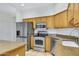 Updated kitchen featuring stainless steel appliances and breakfast bar at 16450 E Avenue Of The Fountain -- # 20, Fountain Hills, AZ 85268