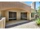 Private, covered patio with tiled flooring and easy access through sliding glass doors at 16450 E Avenue Of The Fountain -- # 20, Fountain Hills, AZ 85268