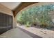 A private patio offers a relaxed outdoor living with its desert garden and tiled flooring at 16450 E Avenue Of The Fountain -- # 20, Fountain Hills, AZ 85268