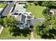 Bird's eye view of the home and expansive backyard, complete with a tennis court at 1712 E Fairfield St, Mesa, AZ 85203