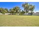Spacious backyard with a trampoline, providing ample room for play and recreation at 1712 E Fairfield St, Mesa, AZ 85203