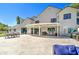 Lovely backyard featuring a covered patio with ample outdoor seating and a large patio at 1712 E Fairfield St, Mesa, AZ 85203
