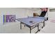 Basement featuring a ping pong table, games, and basketball hoop at 1712 E Fairfield St, Mesa, AZ 85203