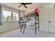 A stylish bedroom featuring a bunk bed with storage, ladder and ample natural light at 1712 E Fairfield St, Mesa, AZ 85203