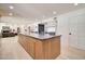 Spacious kitchen island with stone countertop and wood drawers at 1712 E Fairfield St, Mesa, AZ 85203