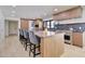 Spacious kitchen island with seating and modern appliances at 1712 E Fairfield St, Mesa, AZ 85203