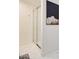Modern bathroom showcasing a glass-enclosed shower with elegant tiling and gold hardware at 1712 E Fairfield St, Mesa, AZ 85203