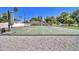 Private tennis court offering a fun and active outdoor experience at 1712 E Fairfield St, Mesa, AZ 85203