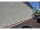 Side yard with gravel and partial view of the air conditioner at 1799 N 209Th Ave, Buckeye, AZ 85396