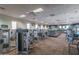Well-equipped gym with modern exercise machines, treadmills, and ample space for fitness activities at 1799 N 209Th Ave, Buckeye, AZ 85396