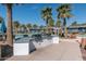 Community outdoor grilling area with built-in grills, providing a convenient space for barbecues by the pool at 1799 N 209Th Ave, Buckeye, AZ 85396