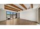 Bright living room with access to the outdoor patio and wood flooring at 2304 Fox Tail Trl, Carefree, AZ 85377