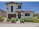 Charming two-story home features desert landscaping and a welcoming front entrance at 2540 N 148Th Dr, Goodyear, AZ 85395